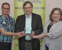 Business Leader of the Year Award Doug Hall and Donna Brothwell from YBID present the Business Leader of the Year Award to Kenn Propp, Harvest Meats