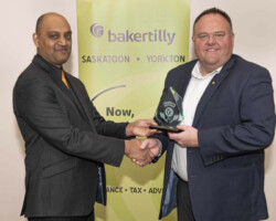 Community Involvement Award Mr. Mike's Steakhouse Casual accepts the Community Involvement Award sponsored by Cornerstone Credit Union from Doug Jones