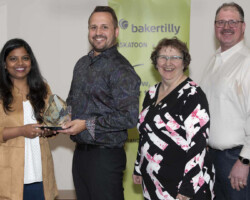 Marketing Award Priya Timiri from Community Futures Ventures, presents the Marketing Award to RCM Outdoors