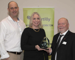 Safety Award Triple A Directional Drilling accepts the Safety Award sponsored by WorkSafe Saskatchewan from Garry Hamblin