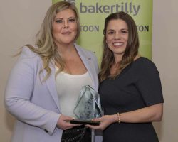 Young Entrepreneur Award Nicole Campbell, Yorkton Concrete 2012 accepts the Young Entrepreneur Award from Amie Evans of TD