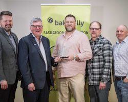 Large Business of the Year Large Business of the Year- Credence Construction: Darcy Spilchen (2nd from L) of Baker Tilly, presented the Large Business of the Year Award to Credence Construction. Accepting the Award were Dustin Brears (L), Francis Ostapovich, Jason Borys and Jodan Bugg.