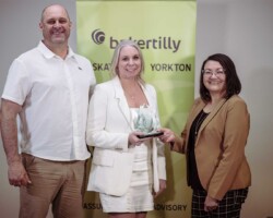 Award of Excellence Award of Excellence – Triple A Directional Drilling: Brooke & Vanessa Andres of Triple A Directional Drilling accept the Award of Excellence presented by Kami De Pape of Suncrest College.