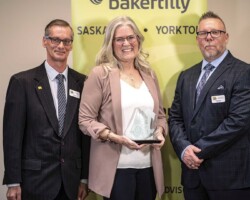 Distinguished Entrepreneur Distinguished Entrepreneur - Laurie Renton: Laurie Renton accepted the Distinguished Entrepreneur Award, sponsored by YBID, from Doug Hull (L) and Todd Kulscar (R).