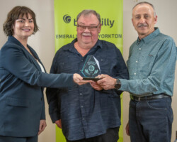 Jenna Niebergall of Suncrest College presented the Award of Excellence to Bruce Cmoc and Jerry Holowauik of Yorkton Welding and Machine (1983) Ltd.