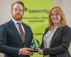 Downtown Culture Fest, an event organized by Yorkton Business Improvement District was a recipient of the Community Merit Award sponsored by SaskTel. Sean Craib-Petkau, YBID Chair accepted the award from Leanne Woodhouse.