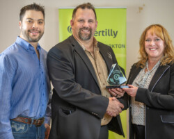 The Community Merit Award sponsored by SaskTel was presented by Leanne Woodhouse to Parkland Outdoor Show and accepted by Nolan Johnson and Darren Wandy.