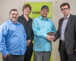 Staff from Vetted HVAC Services accepted the Peoples’ Choice Award presented by Joel Martinuk of FFUN Auto Group.