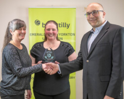 Shannynne and Brittainnie from Yorkton A & W accepted the Relax, Eat, Drink Award presented by Geoff Propp of Harvest Meats.