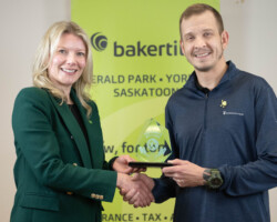 Crystal Springinatic of TD presented the Young Entrepreneur Award to Cole Denesowych of New Outlook Refrigeration.